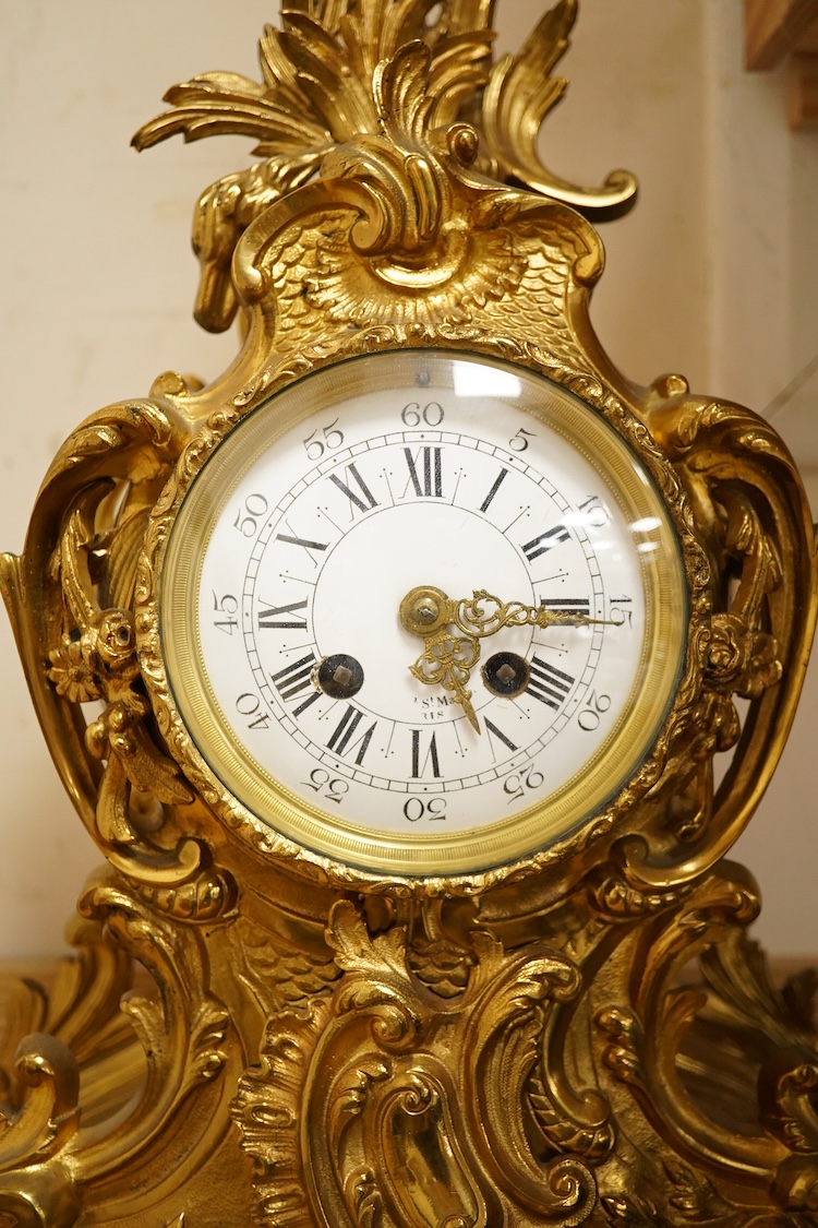 An early 20th century French Louis XV-style ormolu clock garniture - clock 50cm high